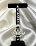 Anfal silver fan-shaped AD maang tikka with clear cubic zirconia stones, displayed on black stand — Famaza Couture premium silver bridal forehead jewelry.