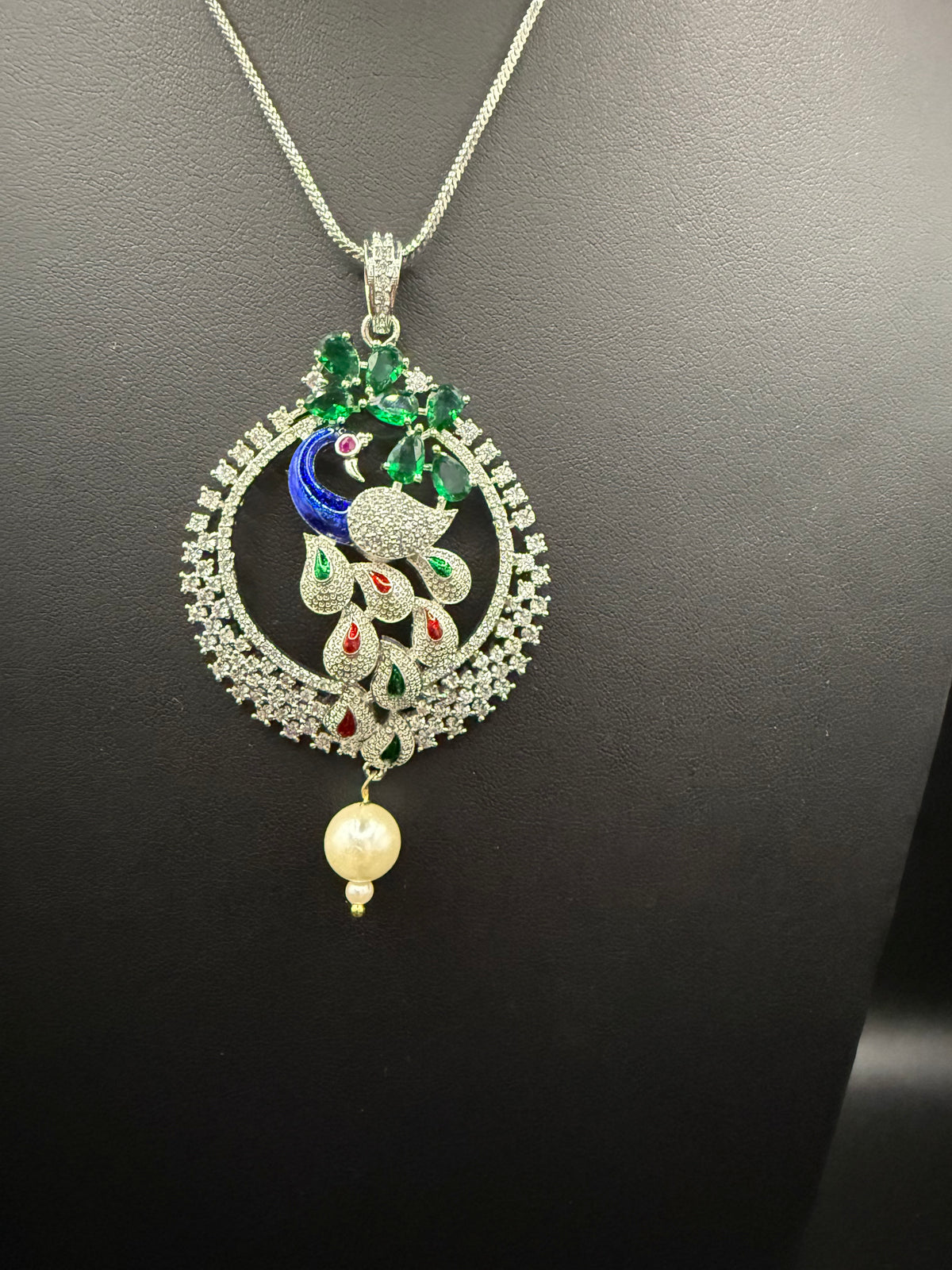 Peacock Pendants Set with earrings | Peacock sitting on swing– Famaza Couture