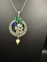 Peacock Pendants Set with earrings | Peacock sitting on swing– Famaza Couture