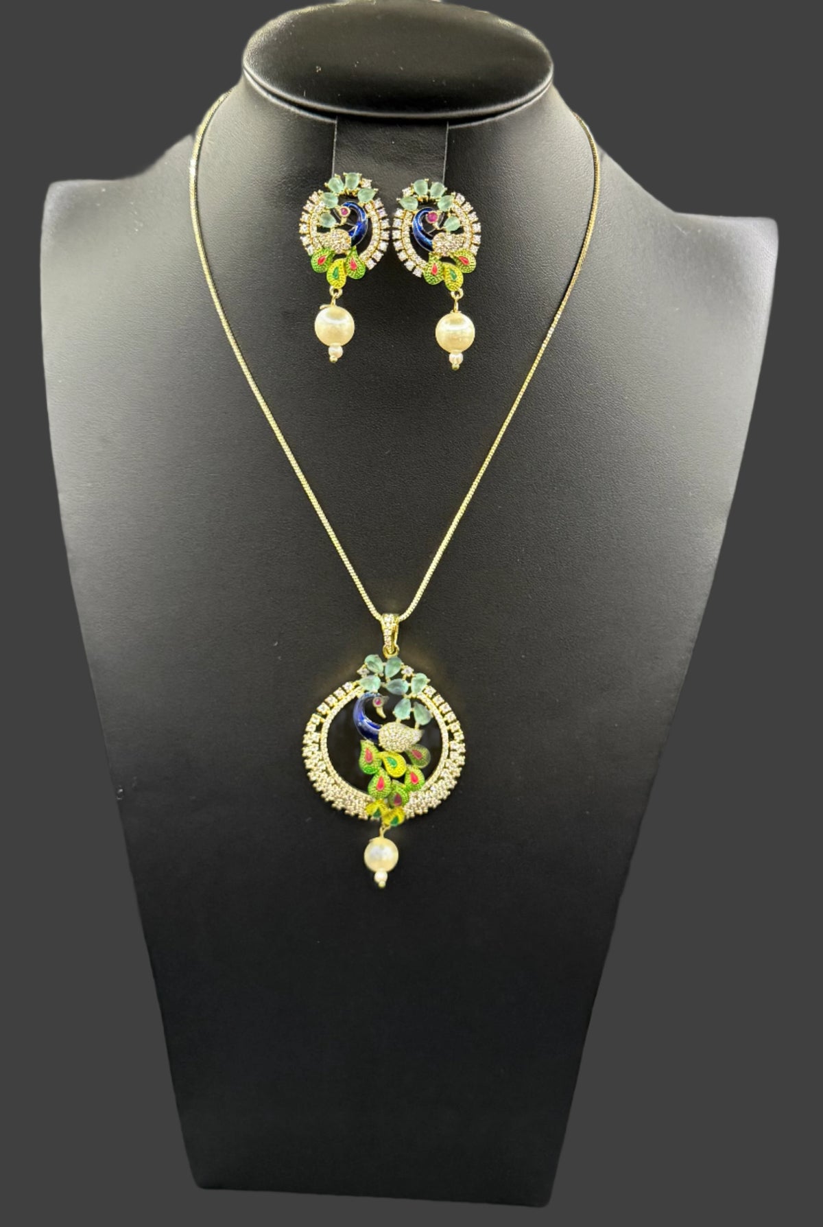 Peacock Pendants Set with earrings | Peacock sitting on swing– Famaza Couture