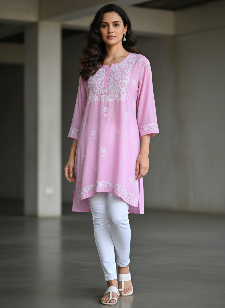 Baby pink colour short length Chikankari kurti with white floral hand embroidery by famaza couture