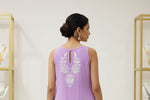 Back view of the lilac chikan Kari kurti, featuring a streamlined silhouette and delicate embroidery accents.
