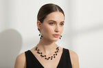 Black beaded necklace and earrings.