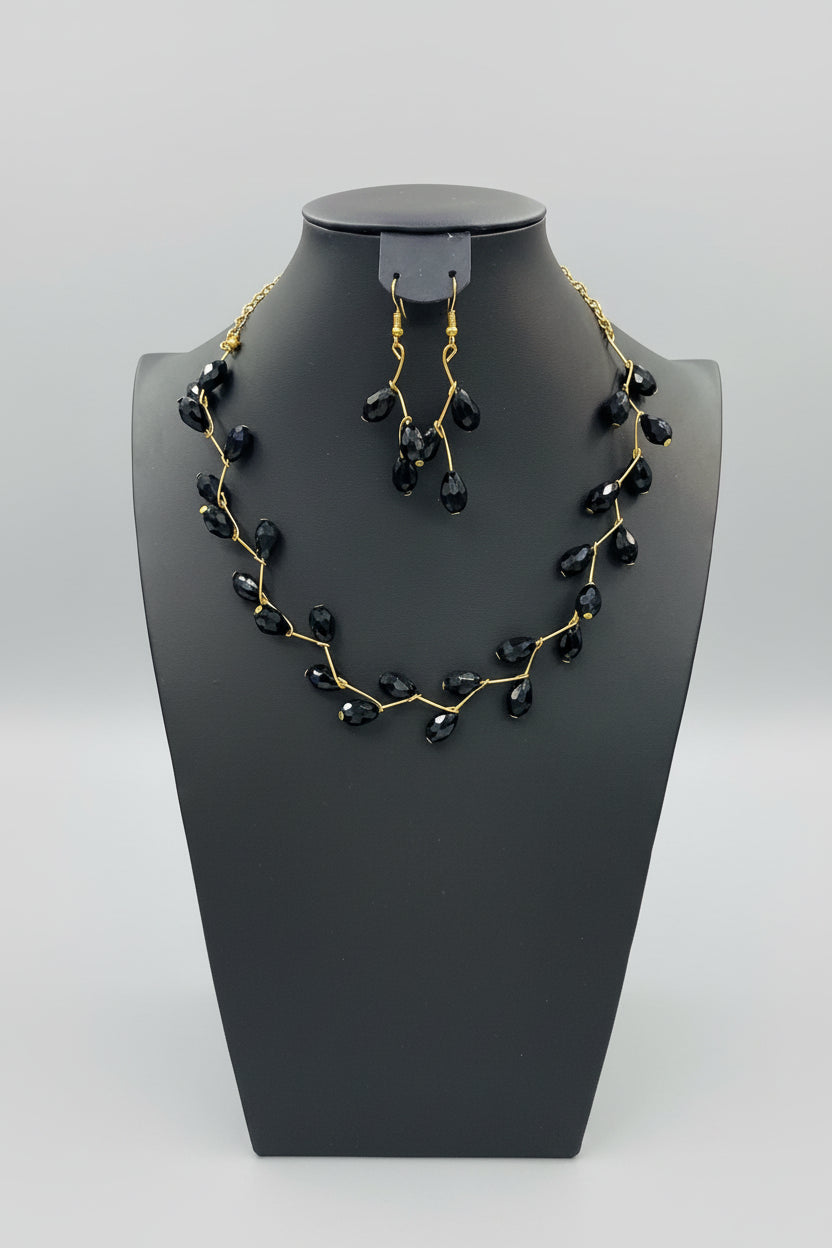 Black beaded necklace and earrings
