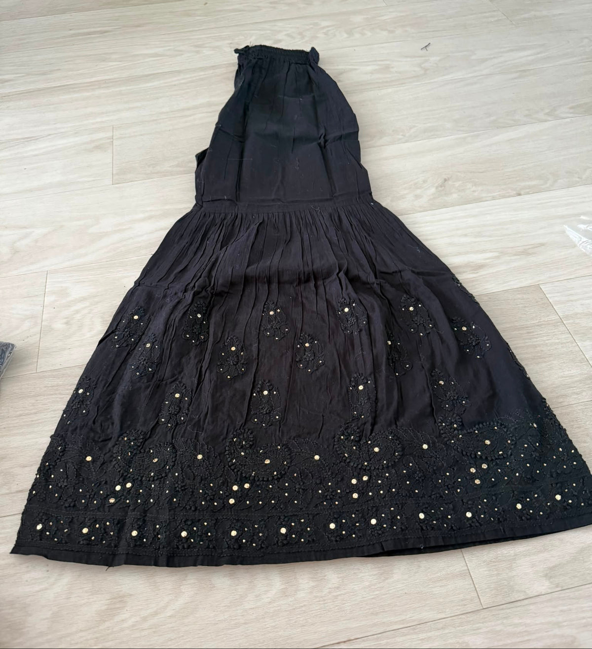 Black cotton Gharara with antique gold kaamdani and hand embroidered bakhiya embroidery.
