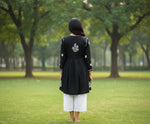 Black short frock with white chikankari embroidery by famaza couture