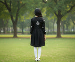 Black short frock with white chikankari embroidery by famaza couture