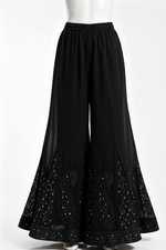 Black sharara with black bakhiya and silver kaamdani work.
