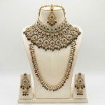Bridal Jewellery set with necklace and earrings on a mannequin bust against a white background