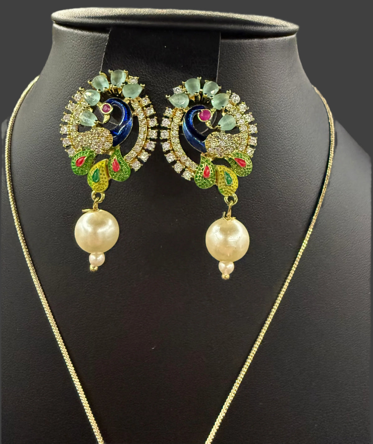 Peacock Pendants Set with earrings | Peacock sitting on swing– Famaza Couture