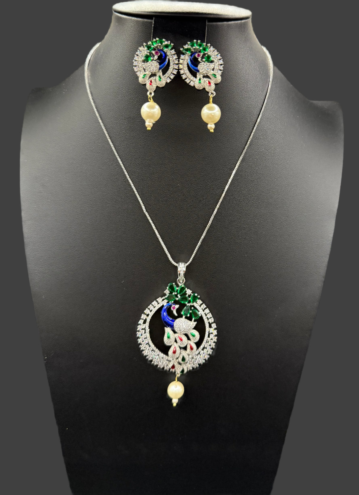 Peacock Pendants Set with earrings | Peacock sitting on swing– Famaza Couture