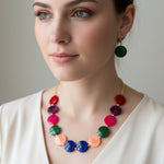 Close-up of Artisanal Multicolor Beaded Necklace with deep Maroon accents, a posh English jewellery statement piece for bridal and evening wear.