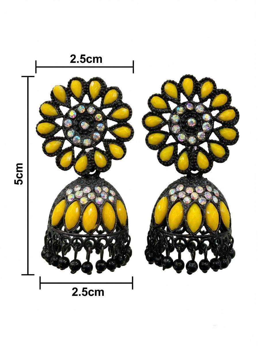 Close-up of black brass jhumka earrings featuring a vibrant yellow floral stone stud and matching yellow stone accents on the jhumka.