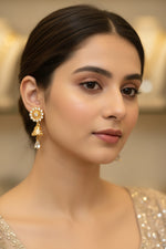 Close-up of the 3cm Zinnia rose gold AD earrings featuring a sunburst floral stud and a hanging jhumka with a teardrop drop.