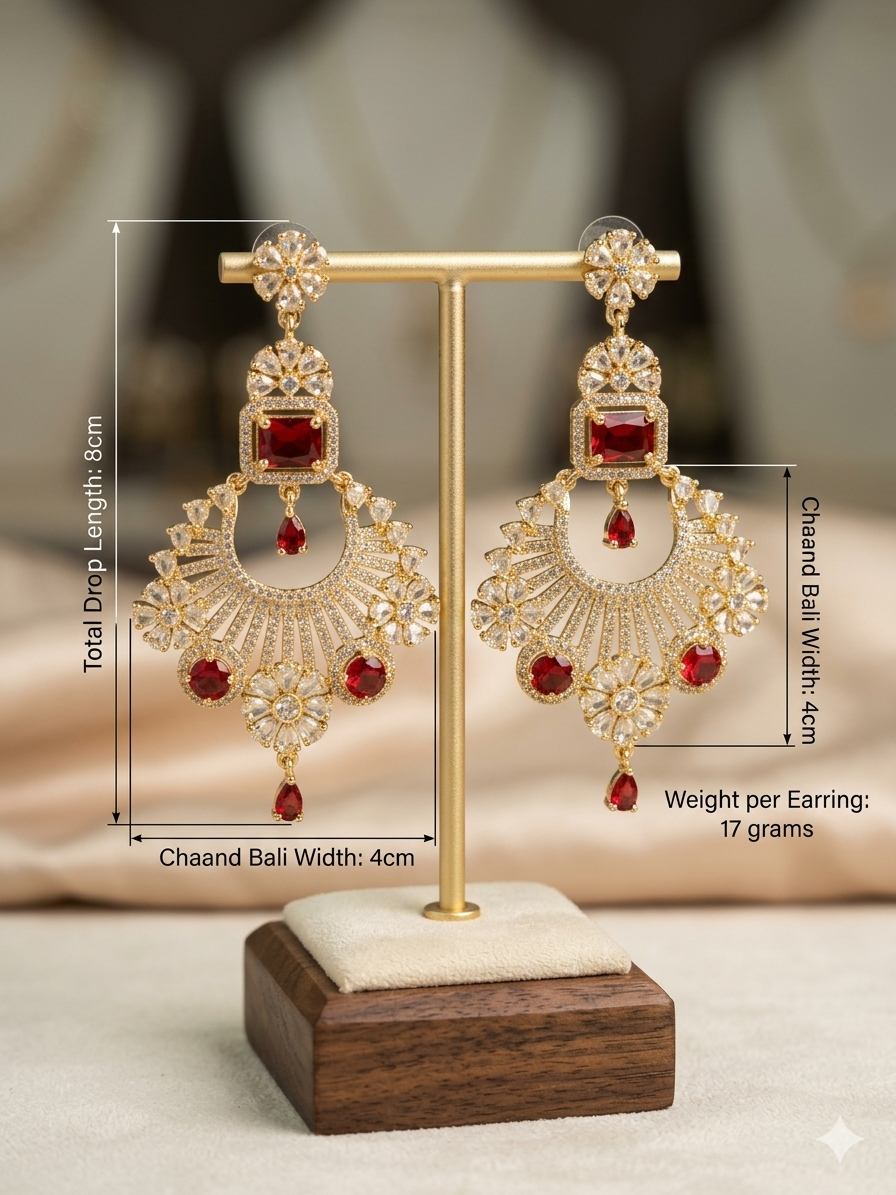Close-up shot of Ruby Blossom gold-plated crescent moon chand baali earrings.