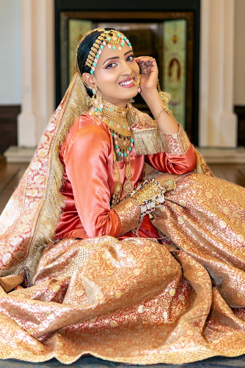 Close up of Kimkhab Brocade fabric and Zari work on Bridal Dress