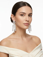 Model wearing elegant silver cubic zirconia chandelier earrings