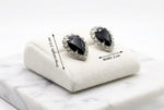 Crystal and pearl stud earrings showing a 2.5cm drop length and 2cm width for a dainty, petite fit.