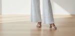 Curvy woman wearing white embroidered modal trousers with kurta