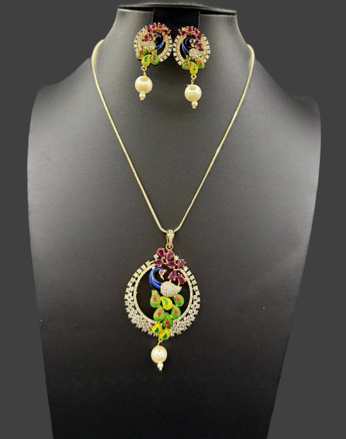 Peacock Pendants Set with earrings | Peacock sitting on swing– Famaza Couture