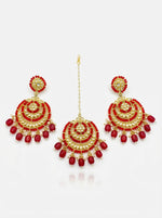 Detailed close-up of circular rose gold ethnic earrings featuring a kundan center and a ruby-toned fringe.