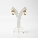 Detailed shot of the 2cm Starlight rose gold polish earrings on a display stand, highlighting the crystal clarity.