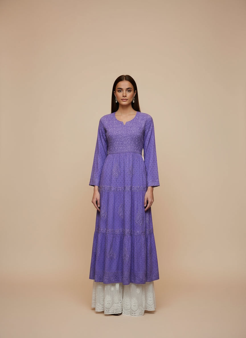 Purple dobby cotton long dress with a white flared trousers on a mannequin in a store setting