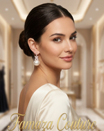 Woman wearing elegant earrings with 'Famaza Couture' branding in a luxurious setting.