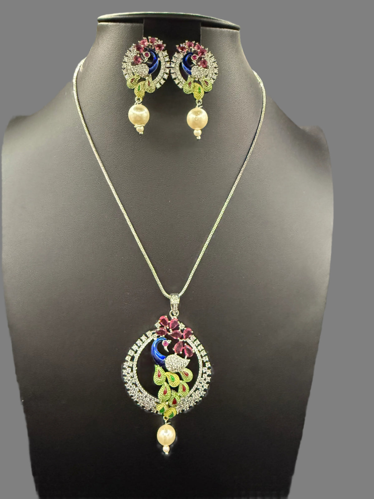 Peacock Pendants Set with earrings | Peacock sitting on swing– Famaza Couture
