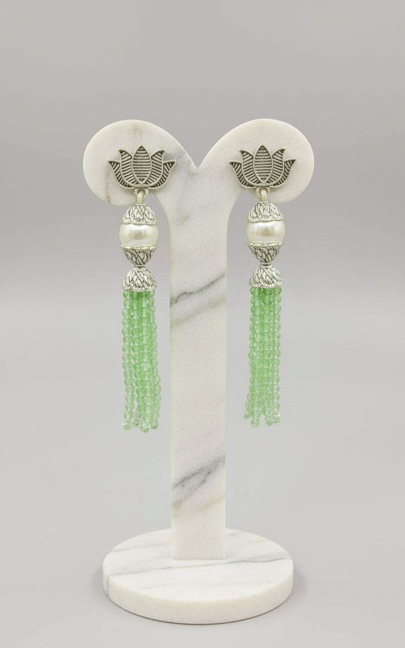 Earrings with Lotus flower stud than white pearl and than lime green colour glass beads multi layers in hanging design.