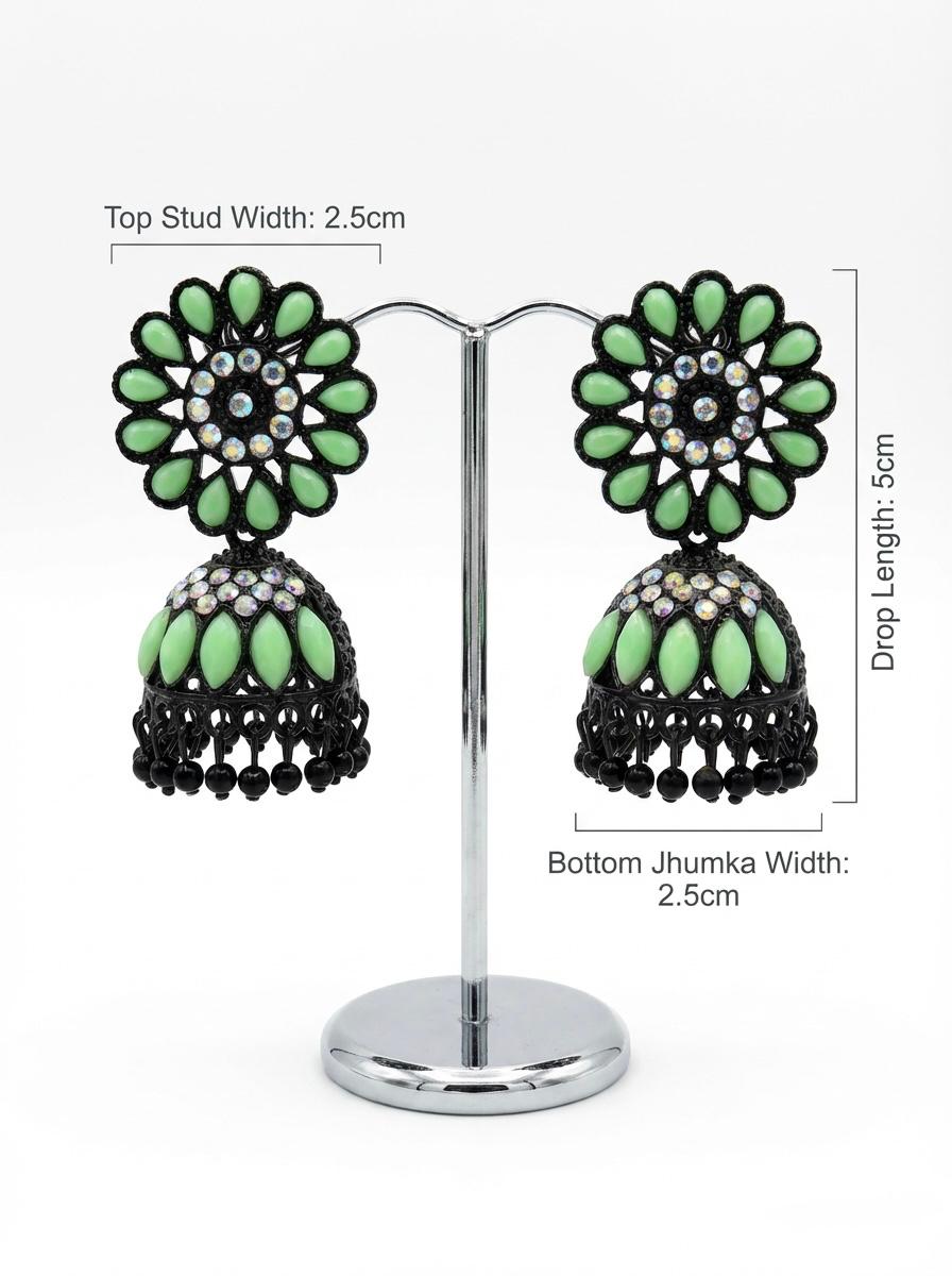 Elegant black brass jhumka earrings featuring a refreshing mint green stone floral stud and matching mint stone inlay on the jhumka dome.