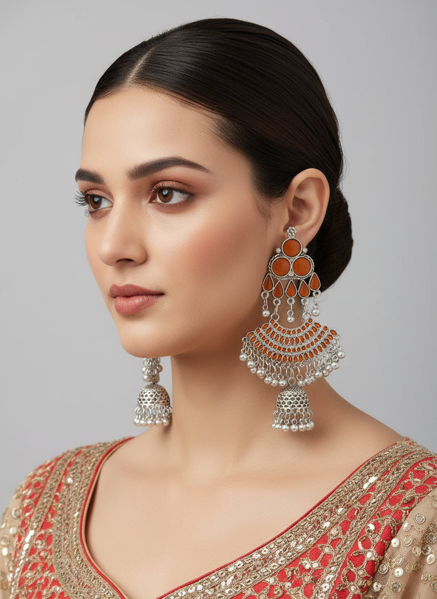 Enamel neon peach oxidised drop earrings by famaza couture