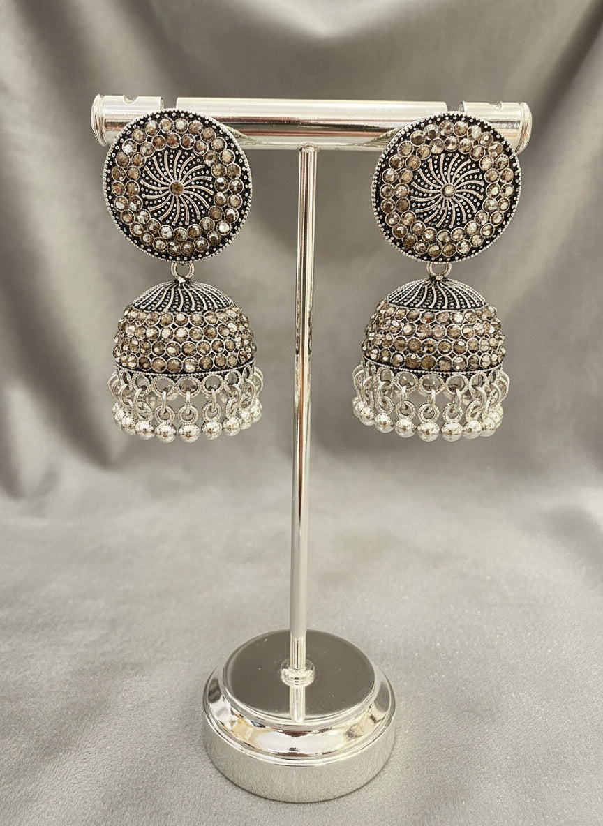 Lightweight silver drop earrings oxidised finish model shot