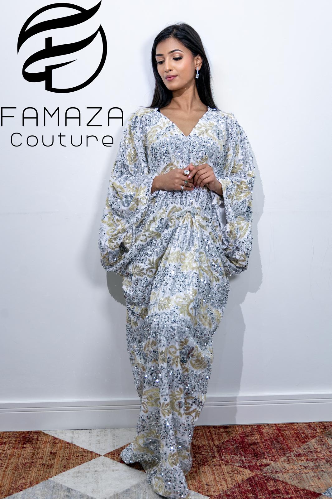 Famaza Couture white velvet kaftan gown with silver sequins and gold floral embroidery, floor-length V-neck formal wear.