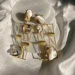 Gold colour Brass metal dangler earrings with Baroque Pearls.