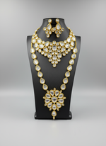 Gold toned kundan chocker necklace and long mala with earrings by famaza couture