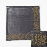 grey colour velvet fabric shawl with gold colour nano beads embellishments and intricate floral patterns.