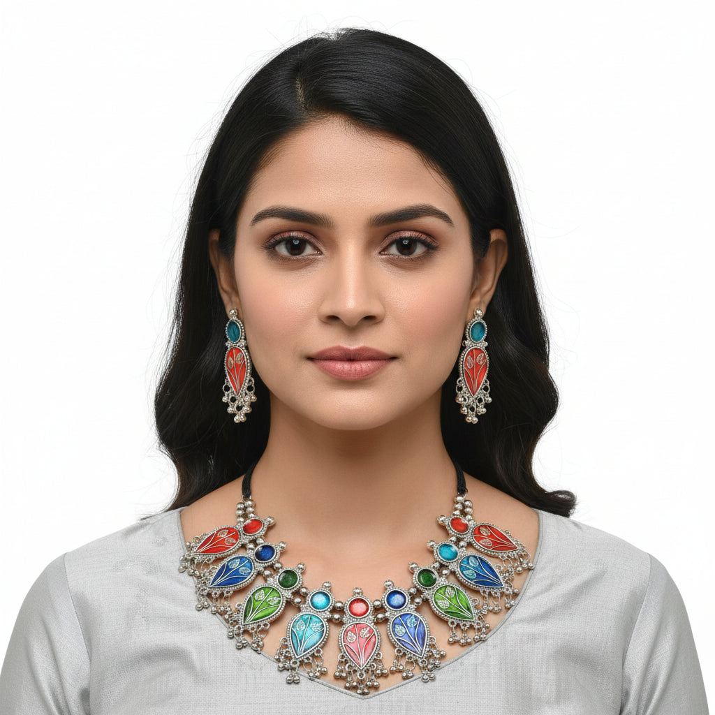 Multicolour oxidised silver necklace and earrings set with red, blue, and green enamel design – handcrafted Indian jewellery by Famaza Couture