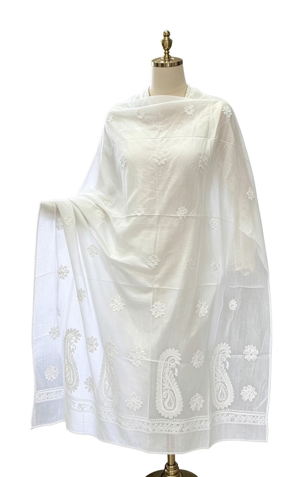 An ethereal ivory lawn chadar featuring delicate hand-rendered Bakhiya Chikankari embroidery and traditional paisley motifs, presented on a minimalist premium stand.