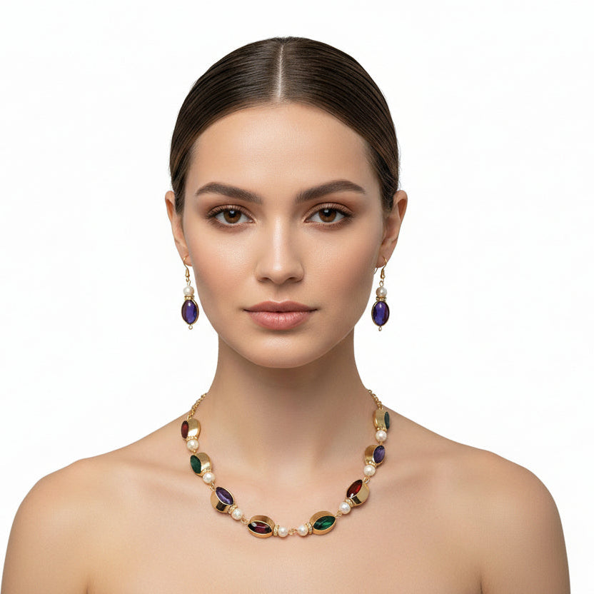 Jewelry set with necklace and earrings on a mannequin bust.