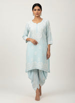 Light blue colour cotton fabric kurti and dhoti trousers.