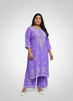 Lilac colour rayon fabric plus size kurti and trousers with white thread chikankari embroidery on the kurti and trousers.