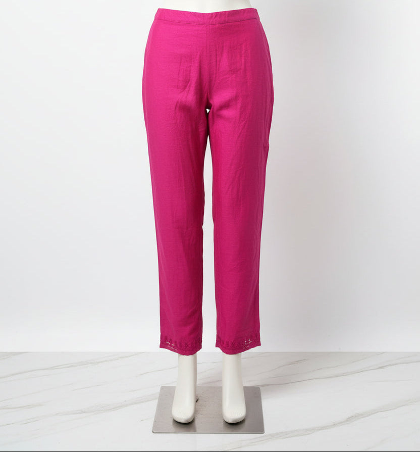 Magenta bright colour chanderi straight trousers are hanging on the hanger