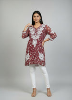 Maroon colour all over printed georgette fabric short length kurti with white thread hand embroidery