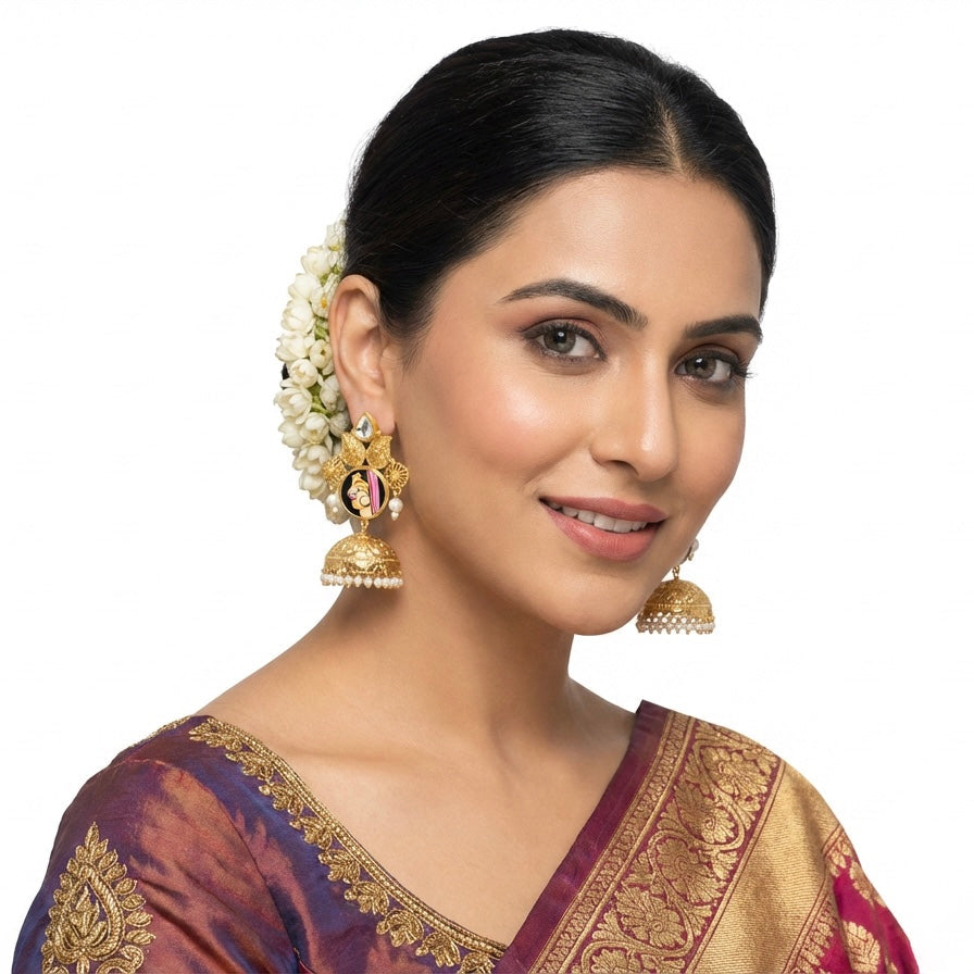 Model is wearing Thani Bani inspired earrings.