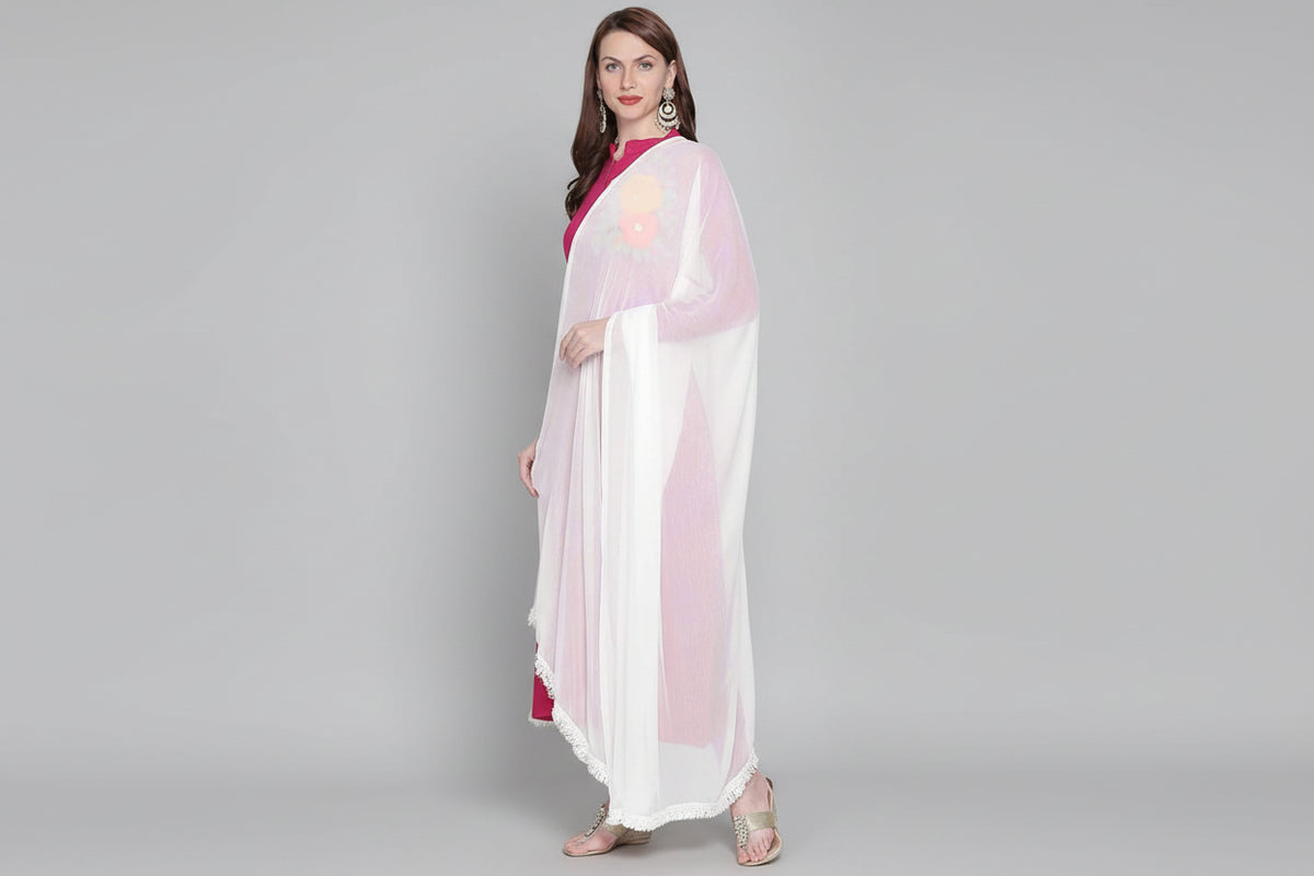 Model is wearing a white chiffon dupatta with lace on both sides, draped over the shoulders.