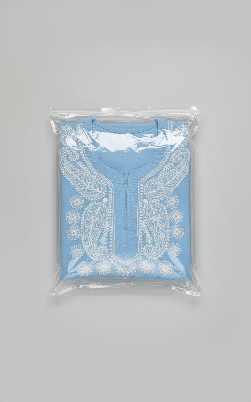 Model is wearing and posing in this sky blue colour cotton kurta front side design with white hand embroidery and wearing white jeans by famaza couture