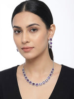 Model is wearing purple gemstones with silver plating choker necklace and matching dangling earrings