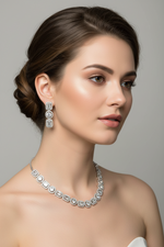 Model is wearing this white gemstones with silver plating choker necklace and matching dangling earrings