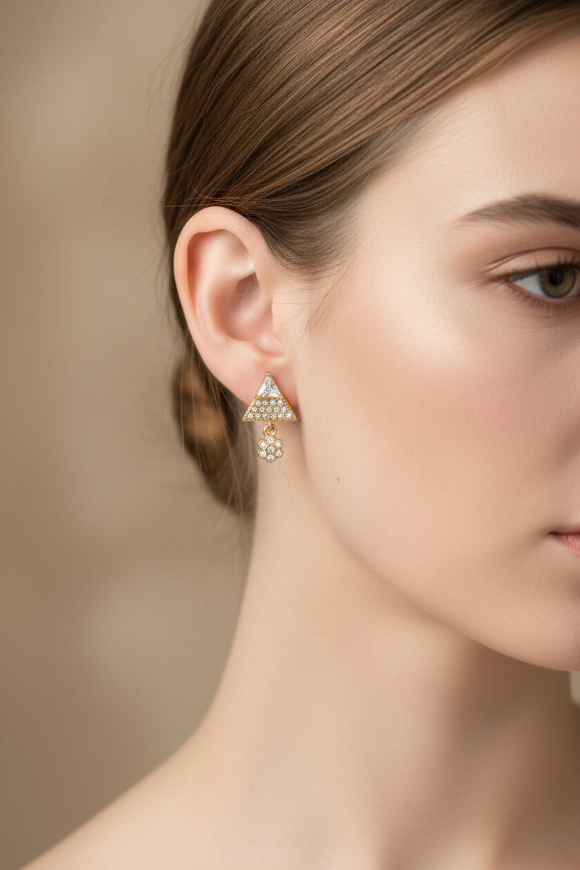 Model wearing the 2cm Starlight rose gold AD earrings, showcasing the petite and elegant drop length.